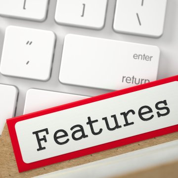 features restoro system optimizer features written on white computer keyboard